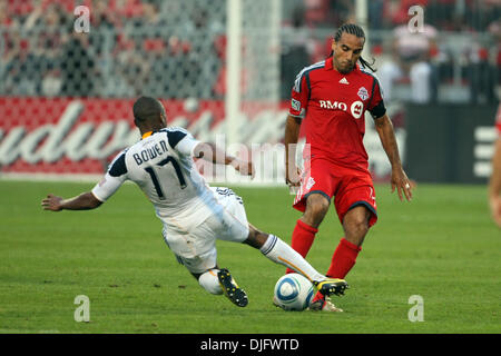 Toronto FC midfielder Dwayne De Rosario (14) and Los Angeles Galaxy forward Tristan Bowen (17) battle for control of the ball at BMO Field in Toronto, Ontario. (Credit Image: © Anson Hung/Southcreek Global/ZUMApress.com) Stock Photo