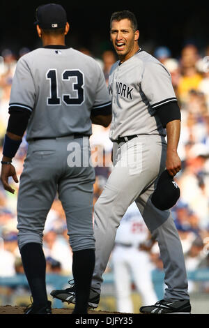 27 Jun  2010:  New York Yankee pitcher Andy Pettite yells at Yankee third baseman Alex Rodriguez after an errant play in the bottom of the third inning cost the Yankees three runs.  The Yankees would go on to win the game 8-6 in extra innings. (Credit Image: © Tony Leon/Southcreek Global/ZUMApress.com) Stock Photo