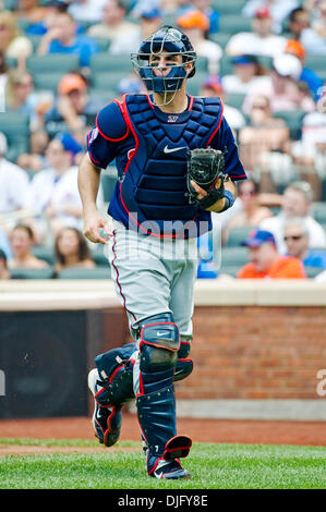 Twins catcher Joe Mauer #7 hits a game tying home run in the top of the 9th  inning during the game between the Minnesota Twins vs Philadelphia Phillies  at Citizens Bank Park