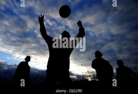 July 05, 2010 - Johannesburg, South Africa - Local children play football on dirt pitches in a Soweto township in Johannesburg. Uruguay will go against the Netherlands Tuesday in the first semifinal at the World Cup football tournament in South Africa. (Credit Image: © Luca Ghidoni/ZUMApress.com) Stock Photo