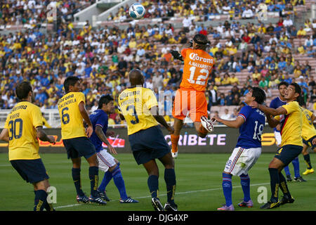 Club America goal keeper Hugo Gonzalez comes out of the box and punches the  ball away from the net, during the first half of a friendly match at the  Rose Bowl in
