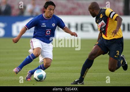 July 10, 2010 - Pasadena, California, United States of America - 10 July 2010: Cruz Azul midfielder Cesar Villaluz dribbles the ball up the pitch, against Club America defender Oscar Roja, during a friendly match at the Rose Bowl in Pasadena, California.       .Mandatory Credit:  Tony Leon / Southcreek Global (Credit Image: © Southcreek Global/ZUMApress.com) Stock Photo