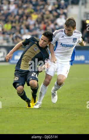July 10, 2010 - Chester, Pennsylvania, United States of America - 10 July 2010: Philadelphia Union midfielder Roger Torres (#20) and San Jose Earthquakes midfielder Bobby Convey (#11) fight for the ball during the match at PPL Park in Chester, PA. The Union lost 2-1. Mandatory Credit: Kate McGovern / Southcreek Global (Credit Image: Â© Southcreek Global/ZUMApress.com) Stock Photo