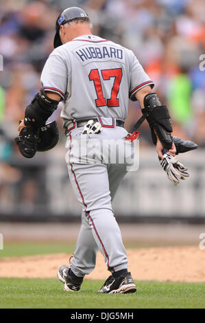 Atlanta Braves coach Glenn Hubbard, left, and infielder Kelly