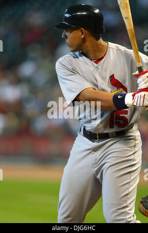 Jon Jay of the St. Louis Cardinals, left, celebrates with teammate Daniel  Descalso after scoring in the seventh inning against the Washington  Nationals in Game 3 of their National League Division Series