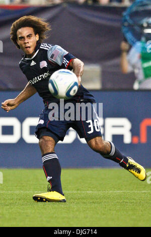 July 12, 2010 - Foxboro, Massachusetts, United States of America - 10 July 2010:  New England Revolution Defender Kevin Alston   (30) watches the ball after he kicks it during match play against the Los Angeles Galaxy at the Gillette Stadium in Foxboro, Massachusetts.  New England Revolution defeated the Los Angeles Galaxy 2 -0..Mandatory Credit: Mark Box / Southcreek Global (Credi Stock Photo