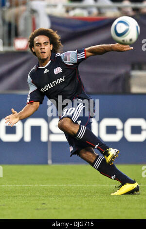 July 12, 2010 - Foxboro, Massachusetts, United States of America - 10 July 2010:  New England Revolution Defender Kevin Alston   (30) watches the ball after he kicks it during match play against the Los Angeles Galaxy at the Gillette Stadium in Foxboro, Massachusetts.  New England Revolution defeated the Los Angeles Galaxy 2 -0..Mandatory Credit: Mark Box / Southcreek Global (Credi Stock Photo