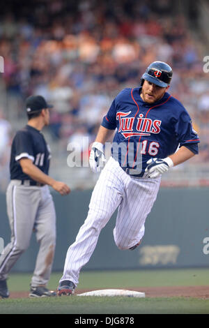 Minnesota Twins' Jason Kubel (16) celebrates his grand slam off