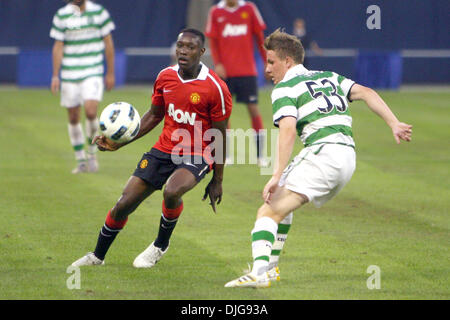 July 16, 2010 - Toronto, Ontario, Canada - 16 July 2010:  Manchester United forward Dimitar Berbatov (9) and Celtic FC midfielder Simon Ferry (53) battle for control of the ball at the Rogers Centre in Toronto, Ontario. Manchester won 3-1..Mandatory Credit: Anson Hung / Southcreek Global. (Credit Image: Â© Southcreek Global/ZUMApress.com) Stock Photo