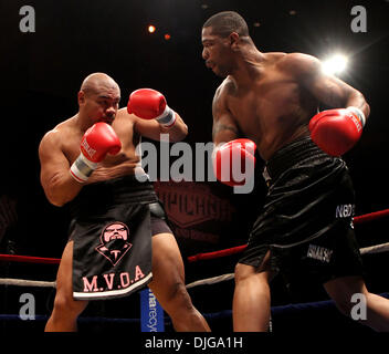 Jul 17, 2010 - Atlantic City , New Jersey , United States - DAVID TUA (Black  w/white trim Skort trunks) vs. MONTE BARRETT (Black Trunks with 2 Gunz on  Band) in action in their 12 Round Heavyweight Bout which ended in a draw in  the Showroom at the