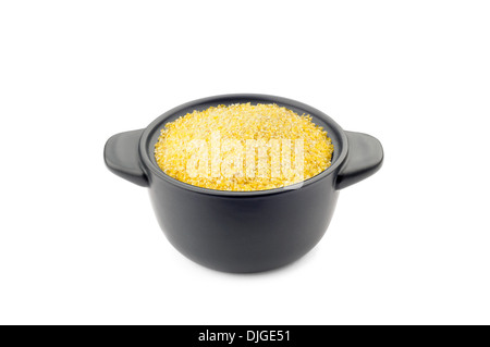 Yellow polenta in a little black ceramic dish Stock Photo