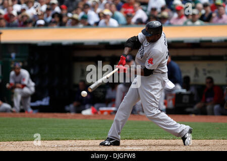 Boston Red Sox designated hitter David Ortiz rounds the bases after hitting  his 50th home run of the season off Minnesota Twins pitcher Boof Bonser  during the sixth inning at Fenway Park