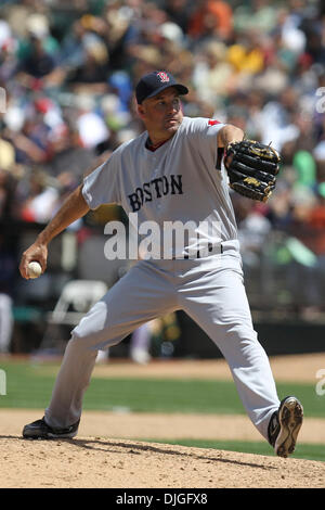 July 21, 2010 - Oakland, California, United States of America - 21-July-2010: Oakland, CA:  Oakland Athletics host the Boston Red Sox.   Boston Red Sox relief pitcher Scott Atchison (48) pitches against the Oakland Athletics.  Oakland Athletics  won the game 6-4.  Mandatory Credit: Dinno Kovic / Southcreek Global Media (Credit Image: © Southcreek Global/ZUMApress.com) Stock Photo