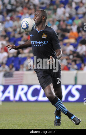 Manchester City Midfielder Patrick Viera 24 Controls The Midfield As The English Premier League Club Manchester City Face Sporting Club De Portugal In The Second Match Of The Barclays New York Football