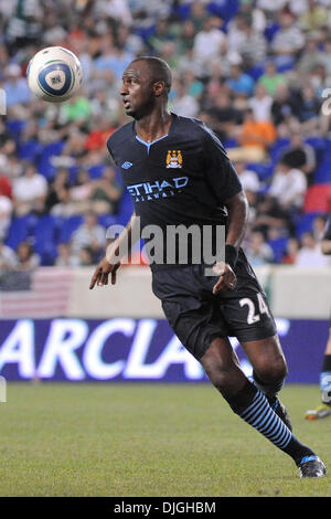 Manchester City Midfielder Patrick Viera 24 Controls The Midfield As The English Premier League Club Manchester City Face Sporting Club De Portugal In The Second Match Of The Barclays New York Football