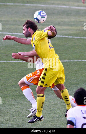 Crew midfielder Adam Moffat (22) and Dynamo forward Cam Weaver (15) head the ball during first-half match action.  The Columbus Crew defeated the Houston Dynamo 3-0 at Crew Stadium in Columbus, Ohio. (Credit Image: © Scott Grau/Southcreek Global/ZUMApress.com) Stock Photo