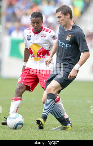 July 25, 2010 - Harrison, New Jersey, United States of America - 25  July 2010:   New York Red Bulls defender  Danleigh Borman  (#11) and Manchester City midfielder Adam Johnson (#11) fight for the ball. The Red Bulls defeated Manchester City 2-1 in the game held at the Barclay Challenge, Red Bull Arena, Harrison, NJ..Mandatory Credit: Anthony Gruppuso / Southcreek Global. (Credit  Stock Photo