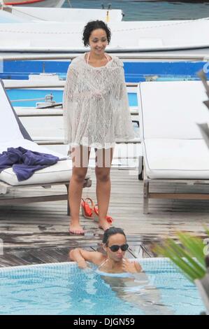 Dominic Cooper and his girlfriend Ruth Negga enjoy a holiday poolside at hotel Della Regina Isabella Ischia, Italy - 12.07.12 Stock Photo