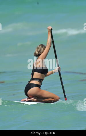 Real Housewives of Miami' star Marysol Patton learns how to paddle board in Miami beach Miami, Florida - 20.07.12 Stock Photo