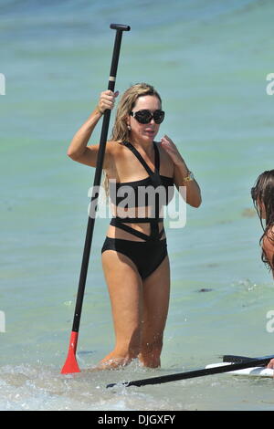 Real Housewives of Miami' star Marysol Patton learns how to paddle board in Miami beach Miami, Florida - 20.07.12 Stock Photo