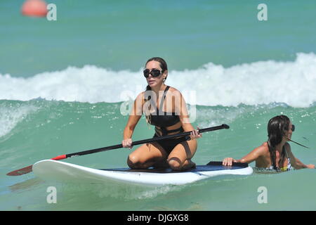 Real Housewives of Miami' star Marysol Patton learns how to paddle board in Miami beach Miami, Florida - 20.07.12 Stock Photo