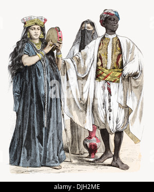 19th century XIX Egyptian playing a tambourine, Muslim female water carrier and n African servant Stock Photo