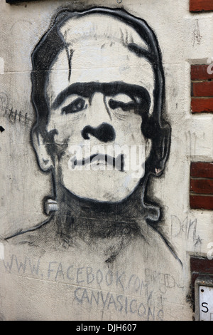 Frankenstein urban street art or graffiti in the historic picturesque West Sussex town of Arundel Stock Photo