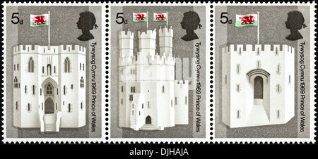 postage stamp United Kingdom 5d featuring Investiture of Prince of Wales dated 1969 bilingual Welsh English language Caernarvon Castle Stock Photo