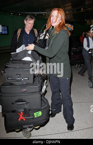 Marcia Cross and husband Tom Mahoney Celebrities seen at LAX airport Los Angeles California - 21.05.12 Stock Photo