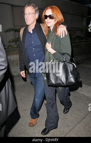 Marcia Cross and husband Tom Mahoney Celebrities seen at LAX airport Los Angeles California - 21.05.12 Stock Photo