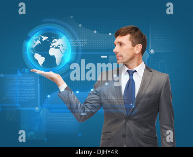 buisnessman holding virtual sphere globe Stock Photo