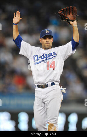 Los Angeles Dodgers' Jamey Carroll is congratulated by Casey Blake