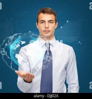 man holding virtual sphere globe on the palm Stock Photo