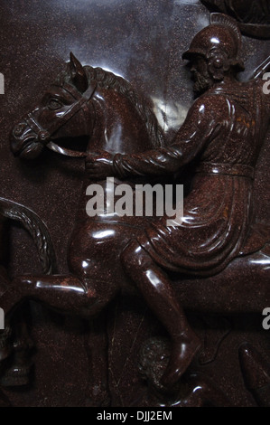 The sarcophagus of Helena. Red porphyry. Carved with military scenes. Detail. Roman soldier on horseback. Stock Photo