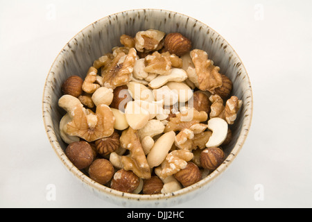 Close up bowl of mixed nuts with white background Stock Photo