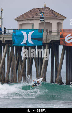 Aug. 06, 2010 - Huntington Beach, California, United States of America - 6 August 2010: Two time world champion, Mick Fanning does a backhand slash in Round 4 of Mens Surfing competetion at the US Open of Surfing in Huntington Beach, California.  Mandatory Credit: Josh Chapel / Southcreek Global (Credit Image: © Southcreek Global/ZUMApress.com) Stock Photo