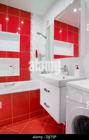 Modern red bathroom interior Stock Photo