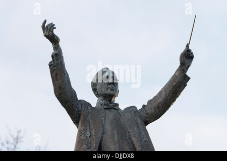 Statue of composer Gustav Holst conducting pose in Imperial Gardens ...