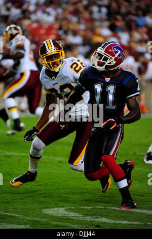 Aug. 13, 2010 - Landover, Maryland, United States of America - 13 August, 2010:  Buffalo Bills Wide Receiver ROSCOE PARRISH (#11) tries to shake Washington Redskins Cornerback CARLOS ROGERS (#22) during the first quarter in their preseason game at FedEx Field in Landover, MD..Mandatory Credit: Rassi Borneo / Southcreek Global (Credit Image: © Southcreek Global/ZUMApress.com) Stock Photo