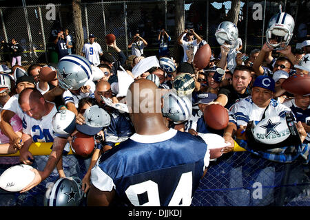 Aug. 14, 2010 - Oxnard, California, United States of America - Aug 14, 2010:  Dallas Cowboys defensive end DEMARCUS WARE (#94) signs autographs at the end of the afternoon practice session..During the first day of preseason practices in Oxnard, California .Mandatory Credit: Tony Leon / Southcreek Global (Credit Image: © Southcreek Global/ZUMApress.com) Stock Photo