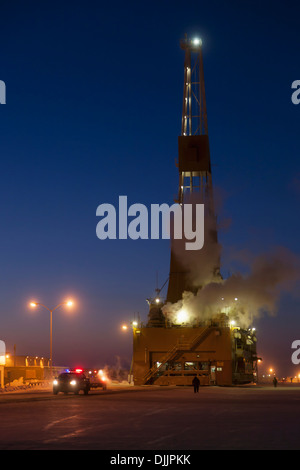 Doyon Oil Rig 14 On The Road Moving To Another Drill Site In The Prudhoe Bay Oil Field, North Slope, Arctic Alaska, Winter Stock Photo