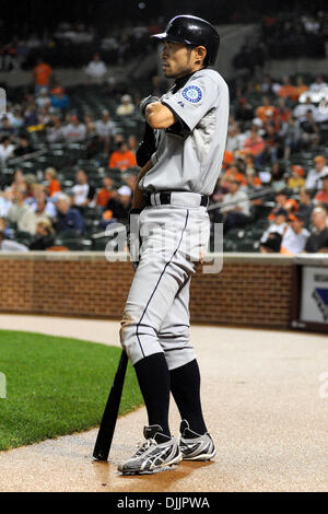 Seattle Mariners' Ichiro Suzuki warms up in the on deck circle before  facing Montreal Expos' Chad Bentz in the fifth inning at Safeco Field in  Seattle on June 12, 2004. (UPI Photo/Jim