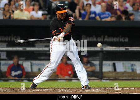 Aug. 20, 2010 - Baltimore, Maryland, United States of America - Baltimore Orioles third baseman Josh Bell (25) swings at a pitch during the third inning of Friday night's game against the Texas Rangers at Camden Yards in Baltimore, MD. The Rangers lead the Orioles 1-0 through three innings...Mandatory Credit: Russell Tracy / Southcreek Global (Credit Image: © Russell Tracy/Southcre Stock Photo