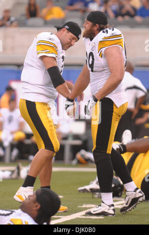 21 Aug, 2010: Pittsburgh Steelers quarterback Ben Roethlisberger (7) and Pittsburgh Steelers defensive end Brett Keisel (99) hi-five during warmups for NFL preseason action between the New York Giants and Pittsburgh Steelers at New Meadowlands Stadium in East Rutherford, New Jersey. (Credit Image: © Will Schneekloth/Southcreek Global/ZUMApress.com) Stock Photo