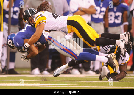 21 Aug, 2010: Pittsburgh Steelers strong safety Troy Polamalu (43) tackles New York Giants wide receiver Steve Smith (12) during first half NFL preseason action between the New York Giants and Pittsburgh Steelers at New Meadowlands Stadium in East Rutherford, New Jersey. (Credit Image: © Will Schneekloth/Southcreek Global/ZUMApress.com) Stock Photo