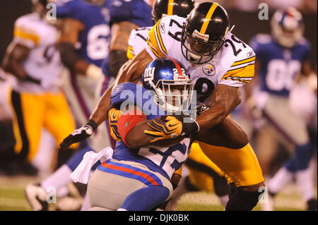 21 Aug, 2010: Pittsburgh Steelers free safety Ryan Mundy (29) tackles New York Giants running back Andre Brown (22) during first half NFL preseason action between the New York Giants and Pittsburgh Steelers at New Meadowlands Stadium in East Rutherford, New Jersey. (Credit Image: © Will Schneekloth/Southcreek Global/ZUMApress.com) Stock Photo