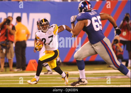 21 Aug, 2010: Pittsburgh Steelers cornerback Joe Burnett (27) returns an interception during first half NFL preseason action between the New York Giants and Pittsburgh Steelers at New Meadowlands Stadium in East Rutherford, New Jersey. (Credit Image: © Will Schneekloth/Southcreek Global/ZUMApress.com) Stock Photo