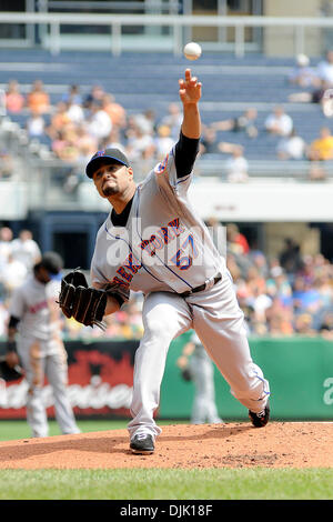 Pittsburgh Pirates starting pitcher Johan Oviedo (24) delivers against the  Texas Rangers in the fourth inning of a baseball game, Wednesday, May 24,  in Pittsburgh. Texas Rangers won 3-2. (AP Photo/Barry Reeger