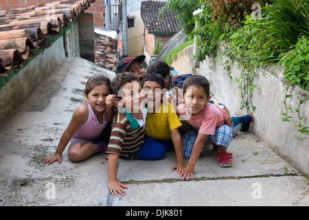 Children on the street in Guatape, Colombia Stock Photo