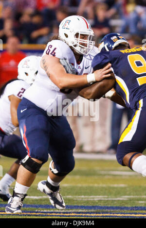 Nebraska defensive tackle Ndamukong Suh #93 goes against Arizona center  Colin Baxter #64 during game action in the Pacific Life Holiday Bowl at  Qualcomm Stadium San Diego, CA. Nebraska defeated Arizona 33-0. (